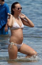 Pregnant OLIVIA WILDE in Bikini at a Beach in Maui 04/28/2016