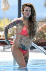 Pregnant SALLIE AXL in Bikini at a Pool in Tenerife 05/11/2016