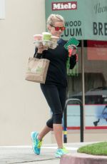 REESE WITHERSPOON Carrying a Handful of Drinks Out in Los Angeles 05/29/2016