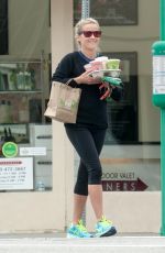 REESE WITHERSPOON Carrying a Handful of Drinks Out in Los Angeles 05/29/2016