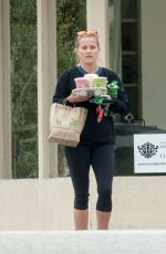 REESE WITHERSPOON Carrying a Handful of Drinks Out in Los Angeles 05/29/2016