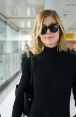 ROSAMUND PIKE at Heathrow Airport in London 05/02/2016