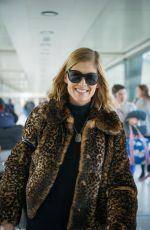 ROSAMUND PIKE at Heathrow Airport in London 05/02/2016