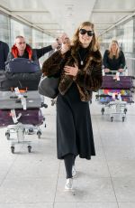 ROSAMUND PIKE at Heathrow Airport in London 05/02/2016
