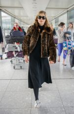 ROSAMUND PIKE at Heathrow Airport in London 05/02/2016