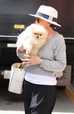 SHARON OSBOURNE with Her Dog Out in Beverly Hills 05/20/2016