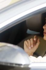 VANESSA HUDGENS Out in Her Car in West Hollywood 05/06/2016