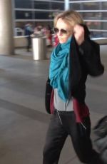 VANESSA PARADIS Smokes a Cigarette at LAX Airport in Los Angeles 05/25/2016