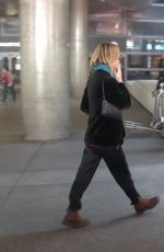 VANESSA PARADIS Smokes a Cigarette at LAX Airport in Los Angeles 05/25/2016