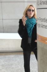VANESSA PARADIS Smokes a Cigarette at LAX Airport in Los Angeles 05/25/2016