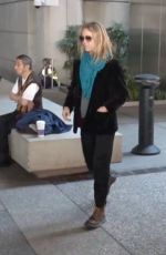 VANESSA PARADIS Smokes a Cigarette at LAX Airport in Los Angeles 05/25/2016