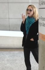VANESSA PARADIS Smokes a Cigarette at LAX Airport in Los Angeles 05/25/2016