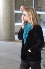VANESSA PARADIS Smokes a Cigarette at LAX Airport in Los Angeles 05/25/2016