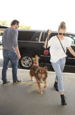 AMANDA SEYFRIED and Her Dog Finn at LAX Airport 06/27/2016