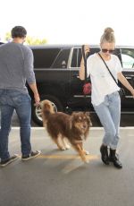 AMANDA SEYFRIED and Her Dog Finn at LAX Airport 06/27/2016