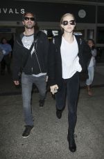 AMANDA SEYFRIED at LAX Airport in Los Angeles 06/25/2016