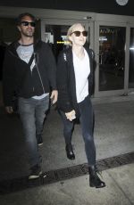 AMANDA SEYFRIED at LAX Airport in Los Angeles 06/25/2016