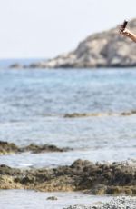 ASHLEY JAMES in Bikini at the Beach in Mykonos 06/14/2016
