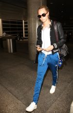 CARA DELEVINGNE at Los Angeles International Airport 06/04//2016