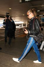 CARA DELEVINGNE at Los Angeles International Airport 06/04//2016