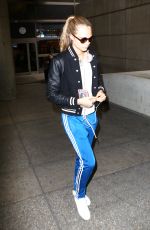 CARA DELEVINGNE at Los Angeles International Airport 06/04//2016