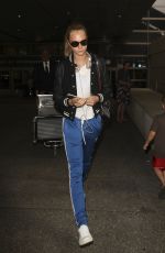 CARA DELEVINGNE at Los Angeles International Airport 06/04//2016