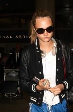 CARA DELEVINGNE at Los Angeles International Airport 06/04//2016