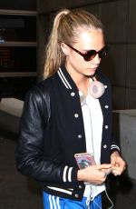 CARA DELEVINGNE at Los Angeles International Airport 06/04//2016