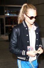 CARA DELEVINGNE at Los Angeles International Airport 06/04//2016