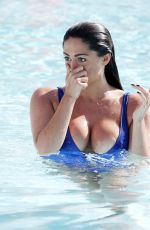 CASEY BATCHELOR in Swimsuit at a Pool in Marbella 06/06/2016