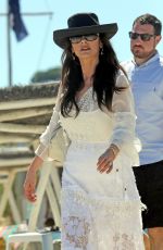 CATHERINE ZETA JONES Arrives at Club 55 in Saint Tropez 06/22/2016