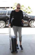 CHARLIZE THERON at LAX Airport in Los Angeles 06/30/2016