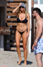 CHARLOTTE MCKINNEY in Bikini at a Beach in Malibu 06/18/2016