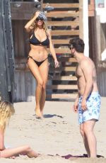 CHARLOTTE MCKINNEY in Bikini at a Beach in Malibu 06/18/2016