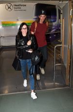 COURTENEY COX at Heathrow Airport in London 06/24/2016