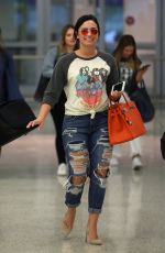 DEMI LOVATO in Ripped Jeans at JFK Airport in New York 06/23/2016