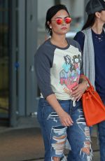 DEMI LOVATO in Ripped Jeans at JFK Airport in New York 06/23/2016
