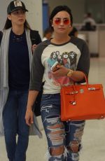 DEMI LOVATO in Ripped Jeans at JFK Airport in New York 06/23/2016