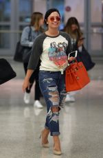 DEMI LOVATO in Ripped Jeans at JFK Airport in New York 06/23/2016