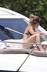 DEMI LOVATO in Swimsuit at a Boat in Miami 06/27/2016