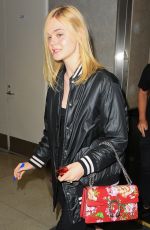 ELLE FANNING at LAX Airport in Los Angeles 06/23/2016