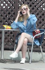 ELLE FANNING in Denim Short Out in Los Angeles 06/28/2016