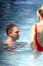 HAILEY BALDWIN in Swimsuit at a Pool in Miami 06/12/2016