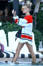 HAILEY BALDWIN in Swimsuit at a Pool in Miami 06/12/2016