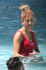 HAILEY BALDWIN in Swimsuit at a Pool in Miami 06/12/2016