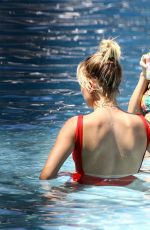 HAILEY BALDWIN in Swimsuit at a Pool in Miami 06/12/2016