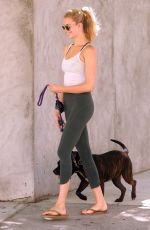 HAILEY CLAUSON Walks Her Dog Out in New York 06/01/2016