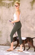 HAILEY CLAUSON Walks Her Dog Out in New York 06/01/2016
