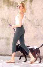 HAILEY CLAUSON Walks Her Dog Out in New York 06/01/2016