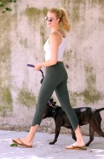 HAILEY CLAUSON Walks Her Dog Out in New York 06/01/2016
